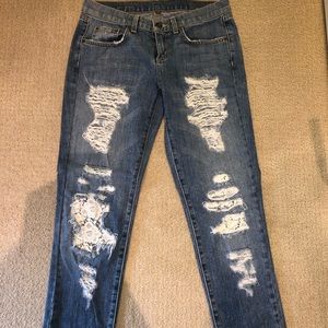 Jeans with lace pockets
